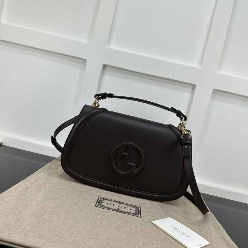 G*u*i top handle bags